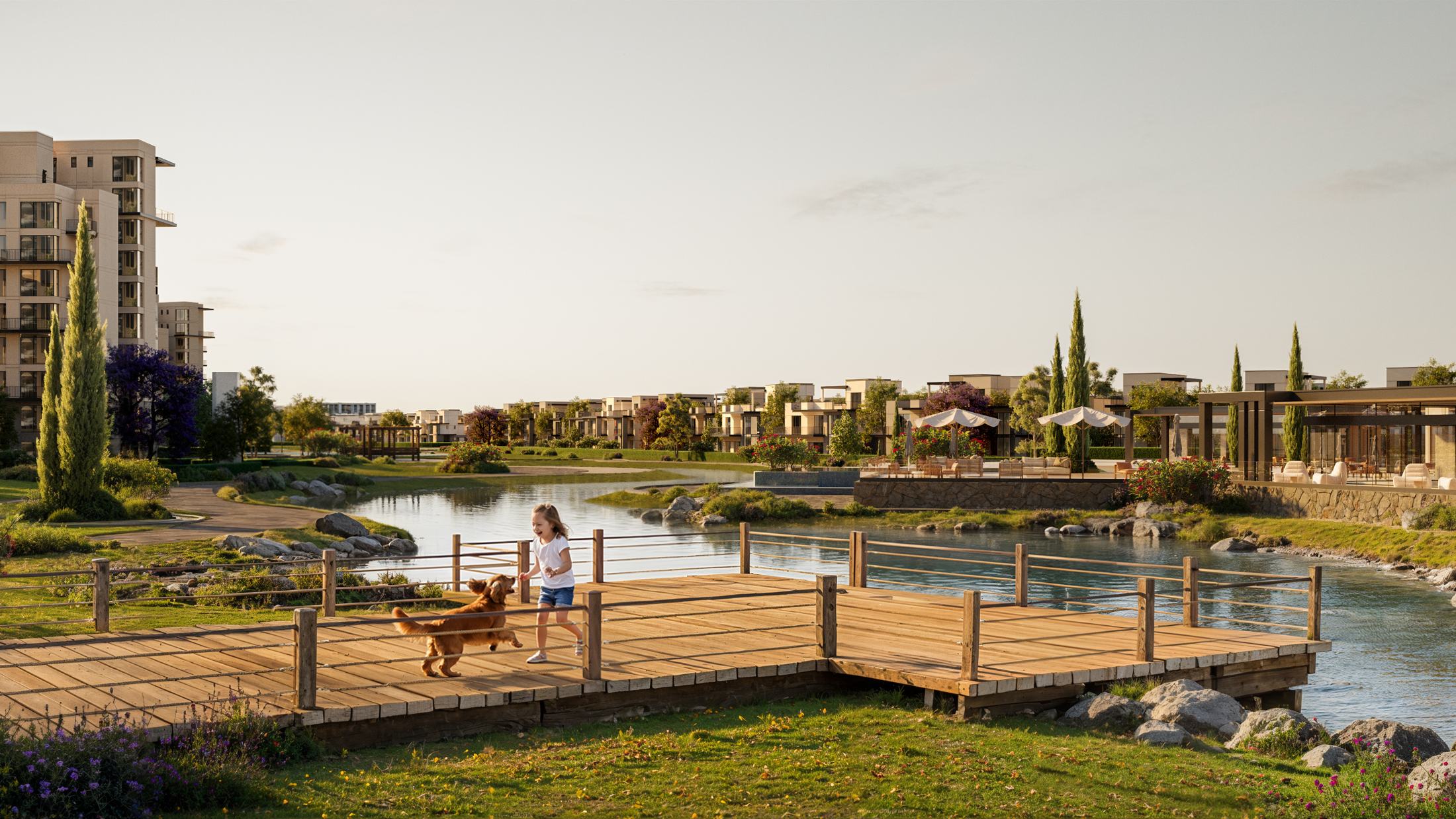 The waterfront district at ONE Hyde Park — a boardwalk along the lake